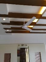 detail of the false ceiling with recessed cove lights.